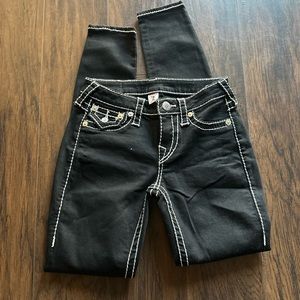 25” True Religion skinny jeans